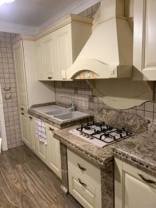Kuchyň nebo kuchyňský kout v ubytování le 4 stelle luminose + 12 fotografií