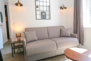 Część wypoczynkowa w obiekcie Le Rétro, T2 hypercentre chic et cosy, Wifi par SOVALFI
