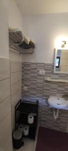 a bathroom with a sink and a toilet and a sink at Studio Marjetica in Zgornje Gorje
