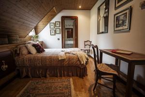 Posteľ alebo postele v izbe v ubytovaní Chalet Casa Pepe Vielha
