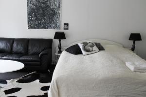 Cama ou camas em um quarto em Det Gamle Apotek Bed & Breakfast