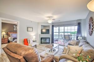 A seating area at Screened Balcony with Views Sleek Lake Ozark Gem!