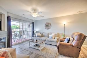 A seating area at Screened Balcony with Views Sleek Lake Ozark Gem!