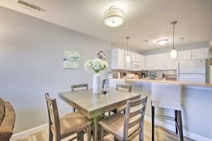 A kitchen or kitchenette at Screened Balcony with Views Sleek Lake Ozark Gem!