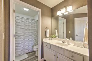 A bathroom at Screened Balcony with Views Sleek Lake Ozark Gem!