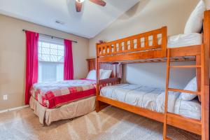 a bedroom with two bunk beds and a window at Collins Lake Condo in Government Camp +26 photos