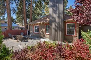a small house with a patio and a table at Manzanita Holiday 3 in South Lake Tahoe