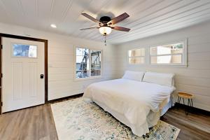 a bedroom with a bed and a ceiling fan at Manzanita Holiday 3 in South Lake Tahoe