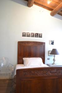 A bed or beds in a room at B&B La Magnolia