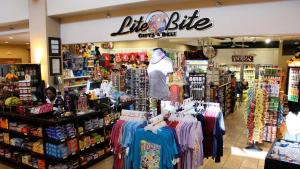 a store with a lot of clothes on display at Rosen Inn Lake Buena Vista in Orlando