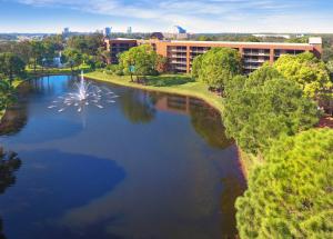 an aerial view of a lake in front of a building at Rosen Inn Lake Buena Vista in Orlando