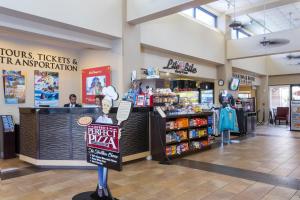 a grocery store with a cash register in a store at Rosen Inn Lake Buena Vista in Orlando