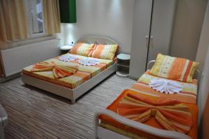 Postel nebo postele na pokoji v ubytování Rooms Turist