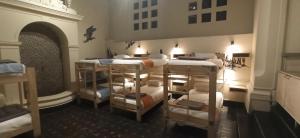 Cama ou camas em um quarto em Hostel Boutique Merced 88