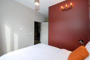 Posteľ alebo postele v izbe v ubytovaní L'Industriel, T2 hypercentre chic et cosy, Wifi par SOVALFI