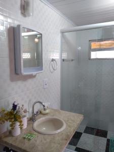 Kylpyhuone majoituspaikassa Suites da Dorinha