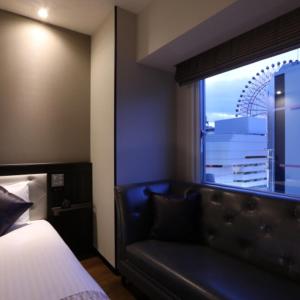 Postel nebo postele na pokoji v ubytování Via Inn Umeda