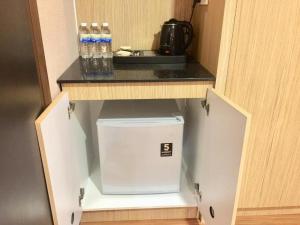 Kuchyň nebo kuchyňský kout v ubytování Hotel Holmes Gp