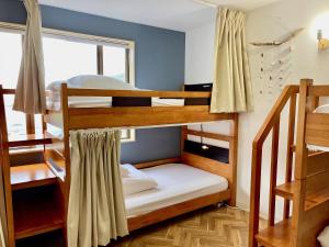 Krevet ili kreveti u jedinici u okviru objekta Guesthouse All you need - All rooms have an ocean view!