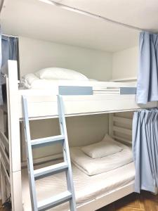 Krevet ili kreveti u jedinici u okviru objekta Guesthouse All you need - All rooms have an ocean view!