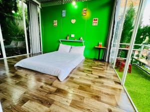 Postel nebo postele na pokoji v ubytování Homestay Vườn Tùng