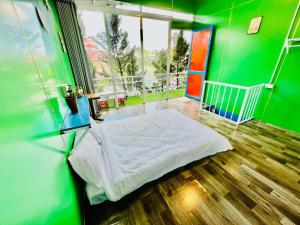 Postel nebo postele na pokoji v ubytování Homestay Vườn Tùng