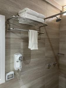 Koupelna v ubytování Rado Hotel - Quintanas