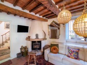 A television and/or entertainment centre at Holiday Home Gioiella near Trasimeno Lake