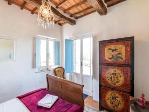 A bed or beds in a room at Holiday Home Gioiella near Trasimeno Lake