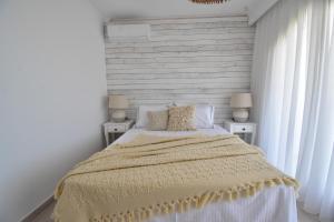 Postel nebo postele na pokoji v ubytování Harmony Villa