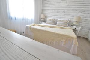 Postel nebo postele na pokoji v ubytování Harmony Villa