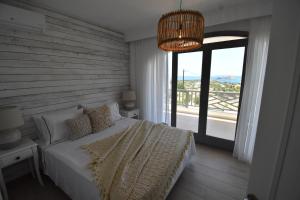 Postel nebo postele na pokoji v ubytování Harmony Villa