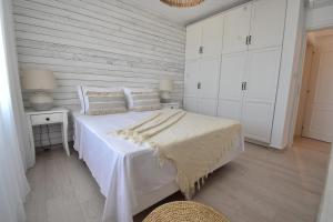 Postel nebo postele na pokoji v ubytování Harmony Villa