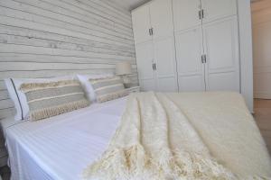 Postel nebo postele na pokoji v ubytování Harmony Villa