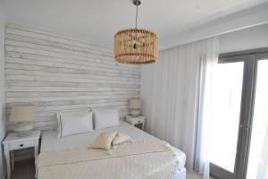 Postel nebo postele na pokoji v ubytování Harmony Villa