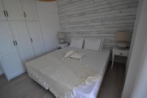 Postel nebo postele na pokoji v ubytování Harmony Villa