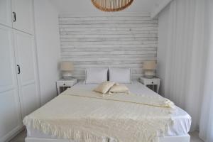 Postel nebo postele na pokoji v ubytování Harmony Villa