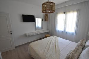 Postel nebo postele na pokoji v ubytování Harmony Villa