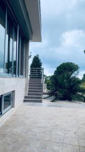 a stairway leading to a building with a staircase at Villa Premium S in Bar