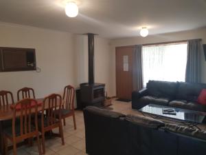 Predel za sedenje v nastanitvi Grampians View Cottages and Units