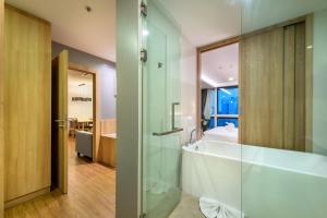 Koupelna v ubytování PLAAI Prime Hotel Rayong SHA Extra Plus