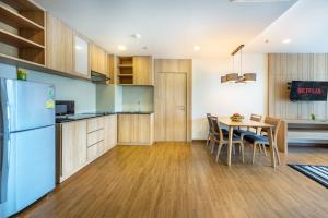 Kuchyň nebo kuchyňský kout v ubytování PLAAI Prime Hotel Rayong SHA Extra Plus