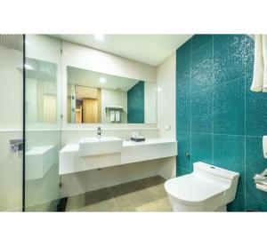 Koupelna v ubytování PLAAI Prime Hotel Rayong SHA Extra Plus