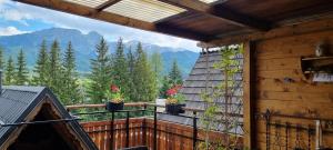 a balcony with a view of the mountains at Willa Leluja in Zakopane