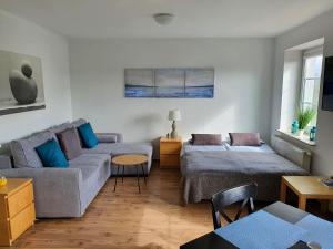 Posedenie v ubytovaní Apartament Węgorzewo przy porcie