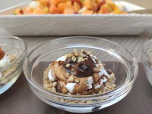 a glass bowl of dessert with chocolate and nuts at ELISEO PALACE TROPEA in Tropea