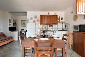 Kuchyňa alebo kuchynka v ubytovaní Villa Belvedere-appartamento Family + 16 fotografií