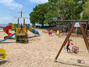 a group of children playing in a playground at Royal Grand Hotel and Spa - All Inclusive and Free beach accsess in Kavarna