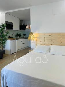 Ένα ή περισσότερα κρεβάτια σε δωμάτιο στο Estudio Aguila3 +17 φωτογραφίες