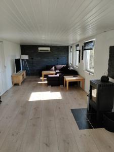 Setusvæði á 210 m2 hus med plads til 8 gæster